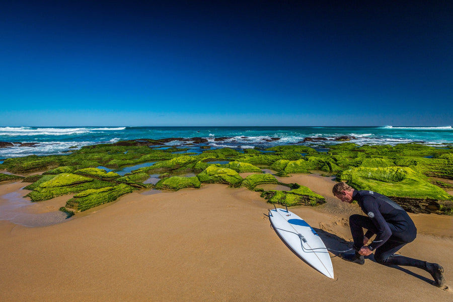Surfer on the Rocks, Australia